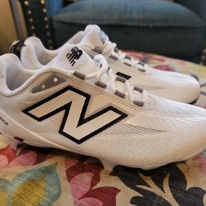 New Balance White and Black Soccer Cleats
